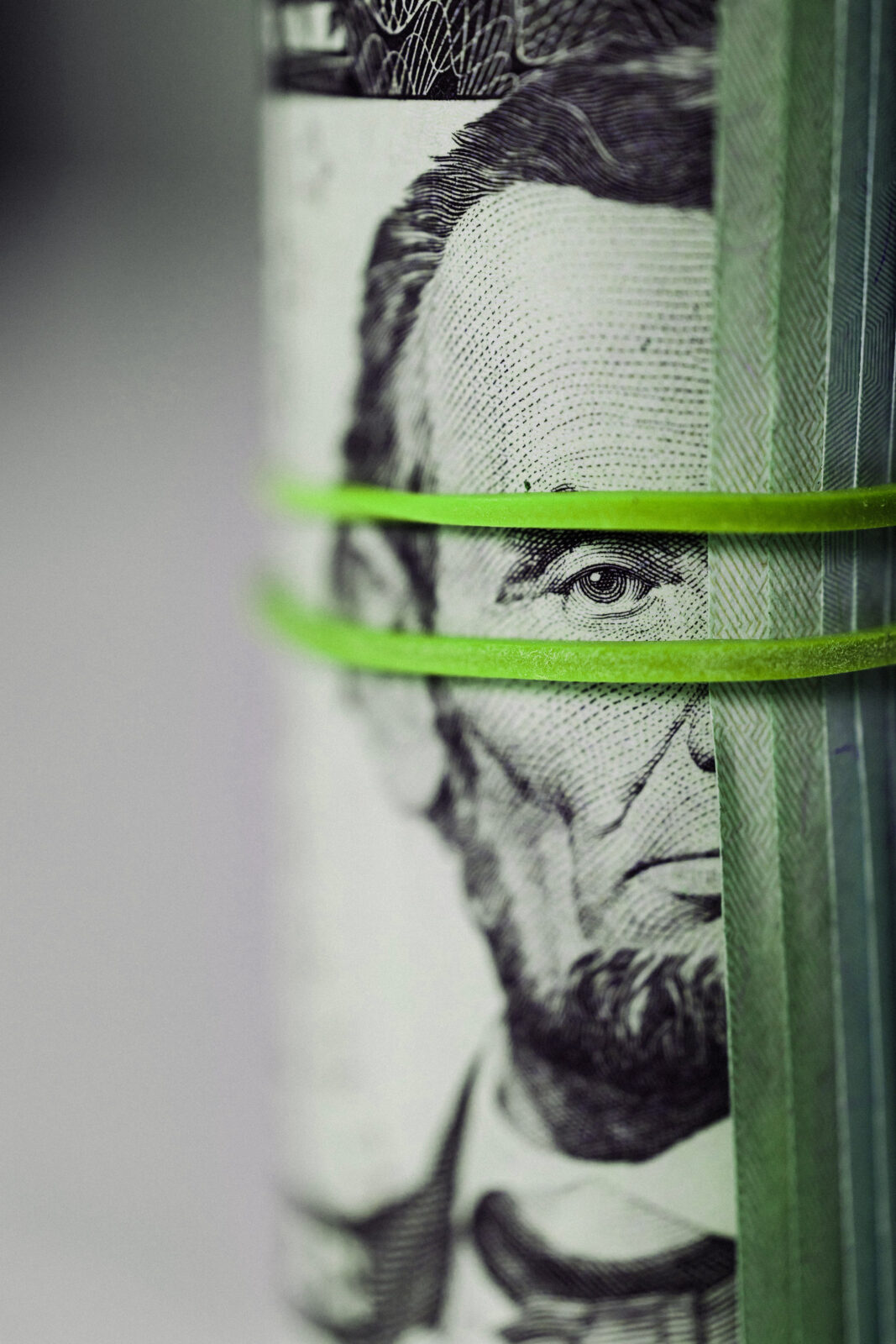 Dollar bills rolled up