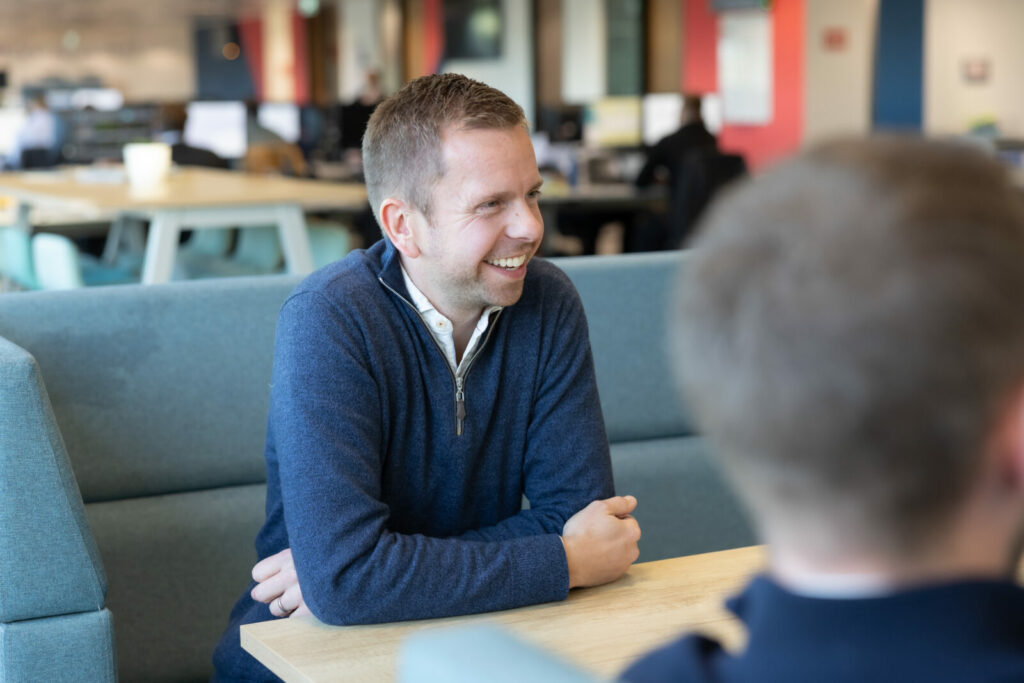 EG-Pay employee in a meeting
